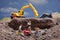 MiniatureÂ Contruction workers working lifting stone using shovel